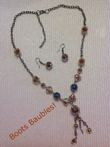 Faceted crystal beaded necklace with earrings.