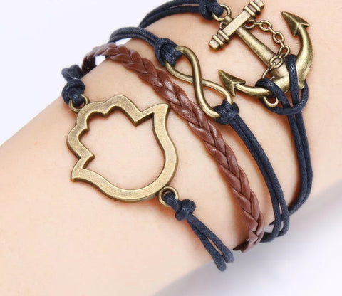 Leather style bracelet in brown and black.