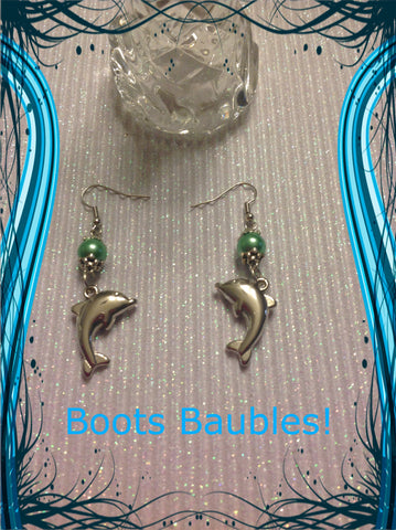 Dolphin pearl dangle earrings in silvertone