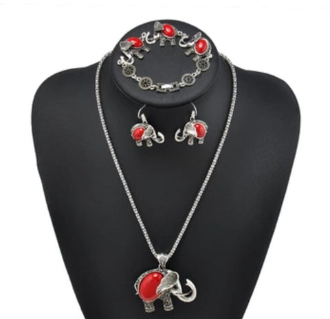 Silvertone elephant set with necklace, bracelet, and earrings