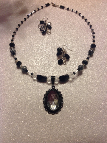 Black and crystal pendant beaded necklace