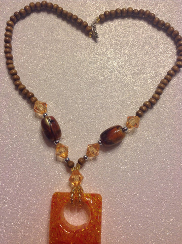 Yellow, brown, peach,  wood beaded necklace.