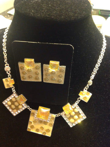Yellow rhinestone bib style necklace and earrings.