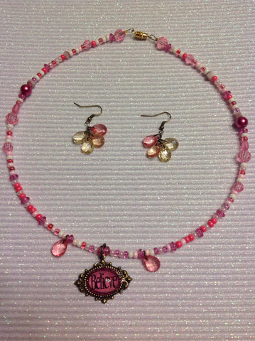 Pink and crystal necklace and earrings believe