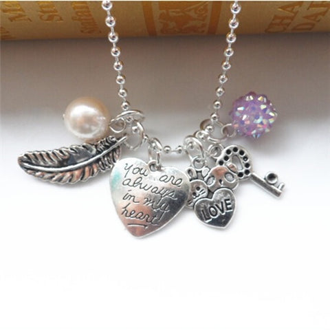 Silvertone "always in my heart charm necklace"