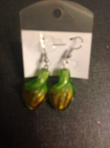 Green and gold glass swirl earrings.