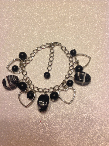 heart charm bracelet with black glass pearls
