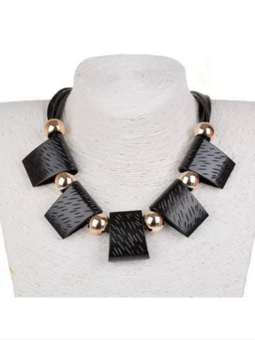 Chunky black and gold necklace