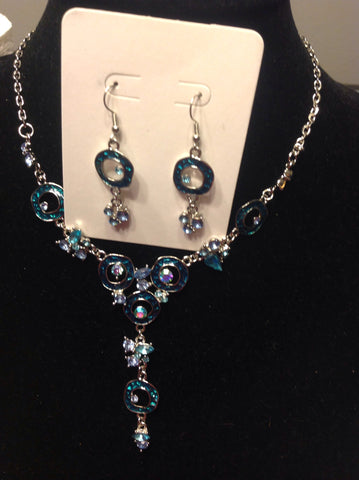 Bib style blue rhinestone necklace and earrings.