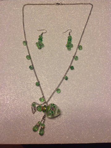 Green perfume bottle necklace with matching earrings