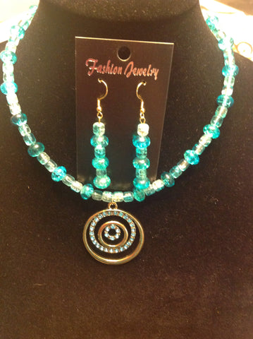 Gold and teal rhinestone necklace with earrings