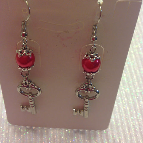 Pearl key charm earrings in silvertone