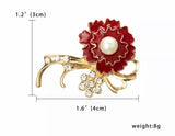Pearl and flower brooch
