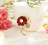 Pearl and flower brooch