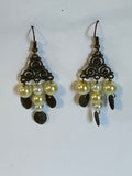 Brown filigree chandelier pearl and leaf earrings