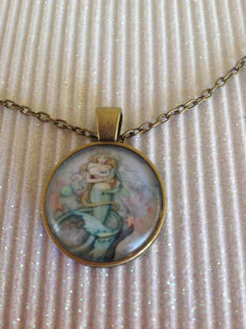 Mermaid and baby glass cabochon necklace