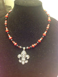 Red black and silver fleur de lis pendant necklace