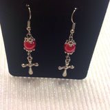 cross dangle earrings with an imitation pearl