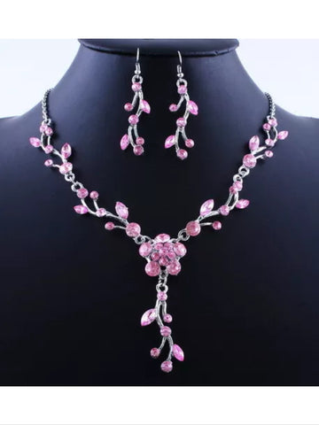 Pink crystal rhinestone necklace and earrings.