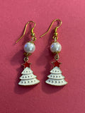 Handcrafted pearl and Christmas tree earrings