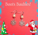 Pearl and snowflake earrings