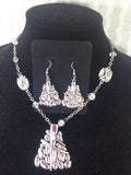 Silvertone pendant and rhinestone necklace with matching earrings