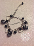 heart charm bracelet with black glass pearls