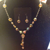 Faceted crystal beaded necklace with earrings.