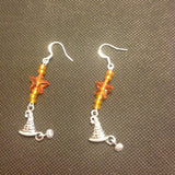 Witches hat earrings in orange