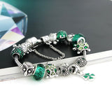 Four leaf clover, turtle, and owl bracelet