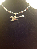 Handmade Silvertone rhinestone  beaded guitar necklace