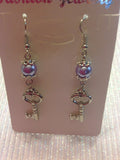 Pearl key charm earrings in silvertone