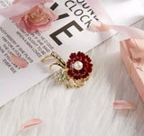 Pearl and flower brooch